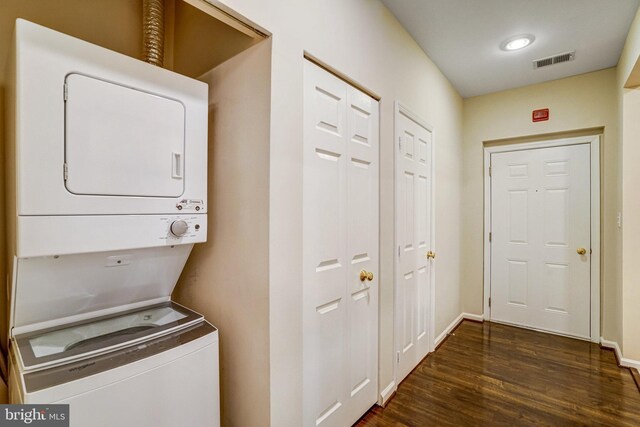 6532 Grange Ln Unit 103, Alexandria, VA 22315 - washroom with stacked washing machine and dryer and wood finished floors