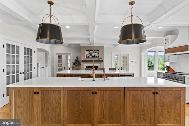 2740 Allen Glen Dr, Mechanicsburg, PA 17055 - kitchen featuring french doors, custom range hood, coffered ceiling, a spacious island, and recessed lighting