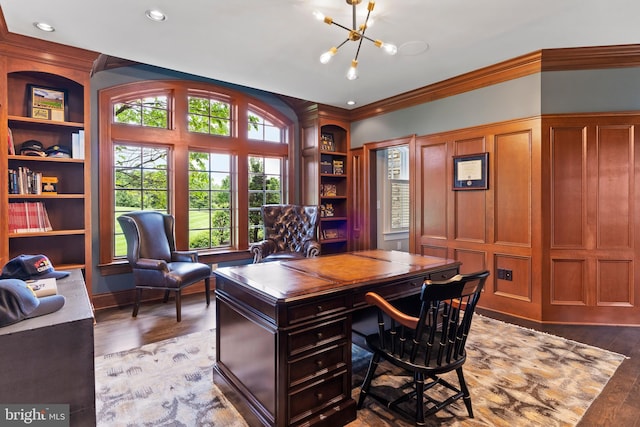 2740 Allen Glen Dr, Mechanicsburg, PA 17055 - office area featuring built in shelves, ornamental molding, wood finished floors, and a chandelier