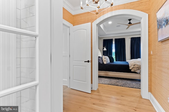 2740 Allen Glen Dr, Mechanicsburg, PA 17055 - corridor featuring ornamental molding, wood finished floors, arched walkways, a chandelier, and a raised ceiling