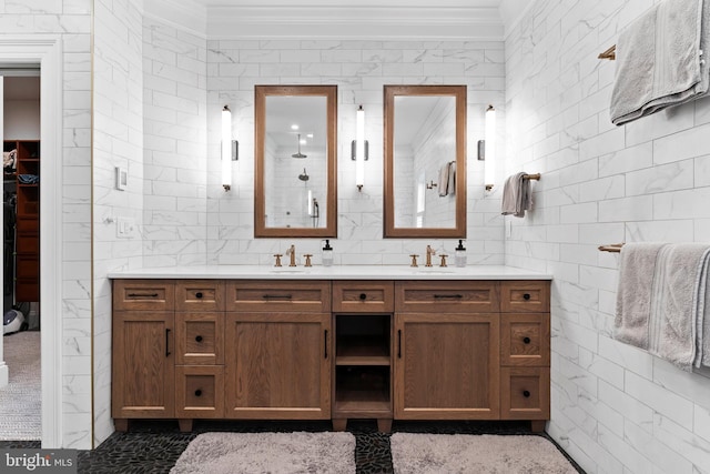 2740 Allen Glen Dr, Mechanicsburg, PA 17055 - bathroom featuring crown molding, double vanity, tile walls, and a walk in closet