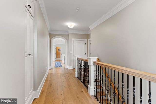 2740 Allen Glen Dr, Mechanicsburg, PA 17055 - hall with arched walkways, crown molding, an upstairs landing, and light wood-style floors
