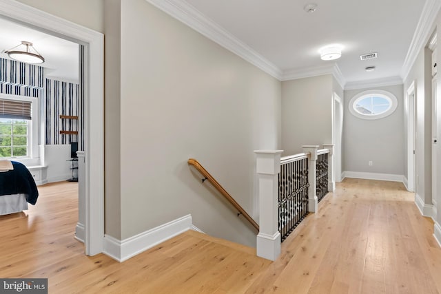 2740 Allen Glen Dr, Mechanicsburg, PA 17055 - hallway with an upstairs landing, light wood-style flooring, and ornamental molding