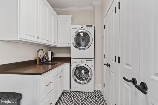 2740 Allen Glen Dr, Mechanicsburg, PA 17055 - laundry area featuring stacked washer and clothes dryer, cabinet space, and crown molding