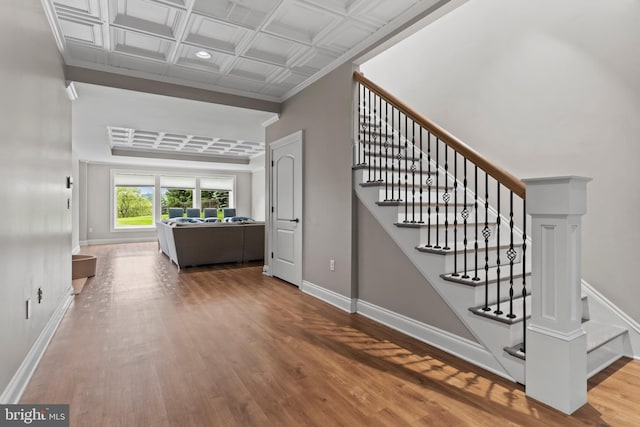 2740 Allen Glen Dr, Mechanicsburg, PA 17055 - staircase featuring wood finished floors, coffered ceiling, and crown molding