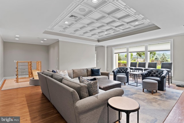 2740 Allen Glen Dr, Mechanicsburg, PA 17055 - living area featuring wood finished floors, a raised ceiling, recessed lighting, and crown molding