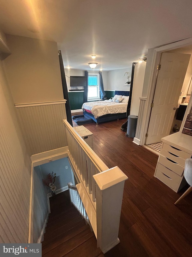 3030 Edgemont St, Philadelphia, PA 19134 - bedroom featuring dark wood-style floors and wainscoting