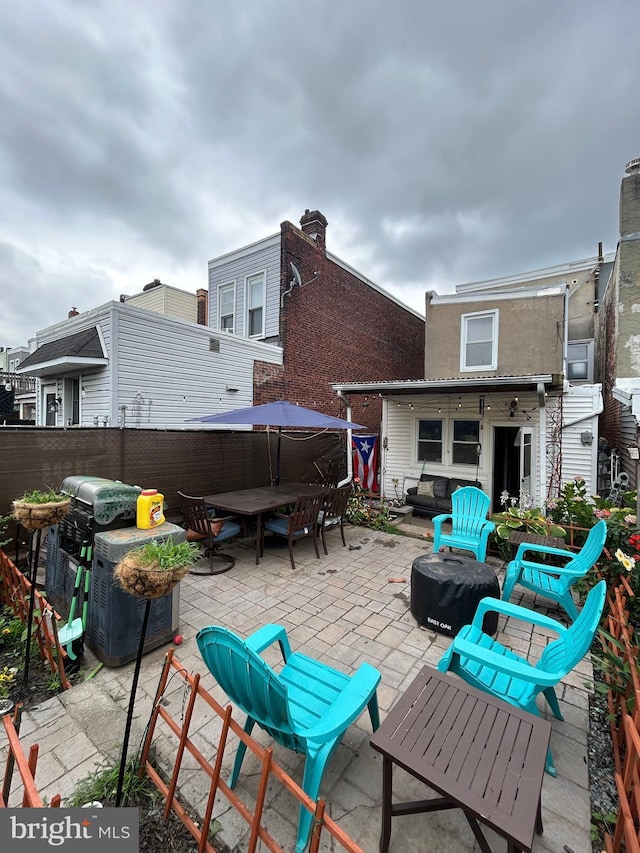 3030 Edgemont St, Philadelphia, PA 19134 - view of patio featuring a fire pit