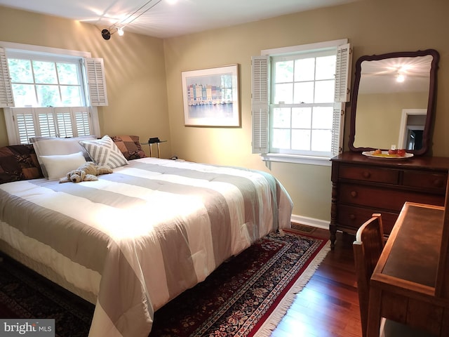 540 Weadley Rd, King Of Prussia, PA 19406 - bedroom with multiple windows and dark wood-type flooring