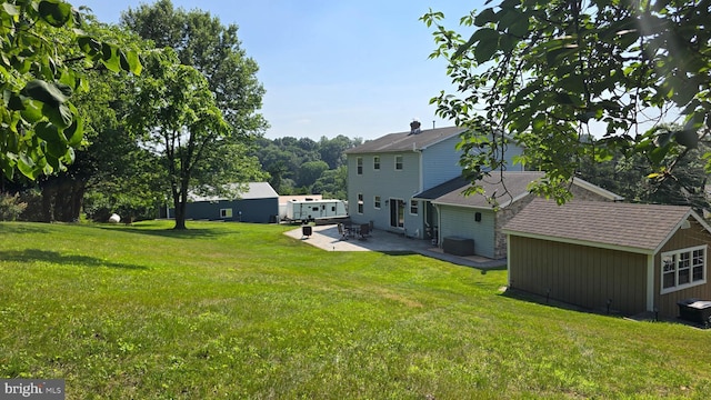 93 W Center St, Glen Rock, PA 17327 - view of grassy yard featuring a patio and a shed