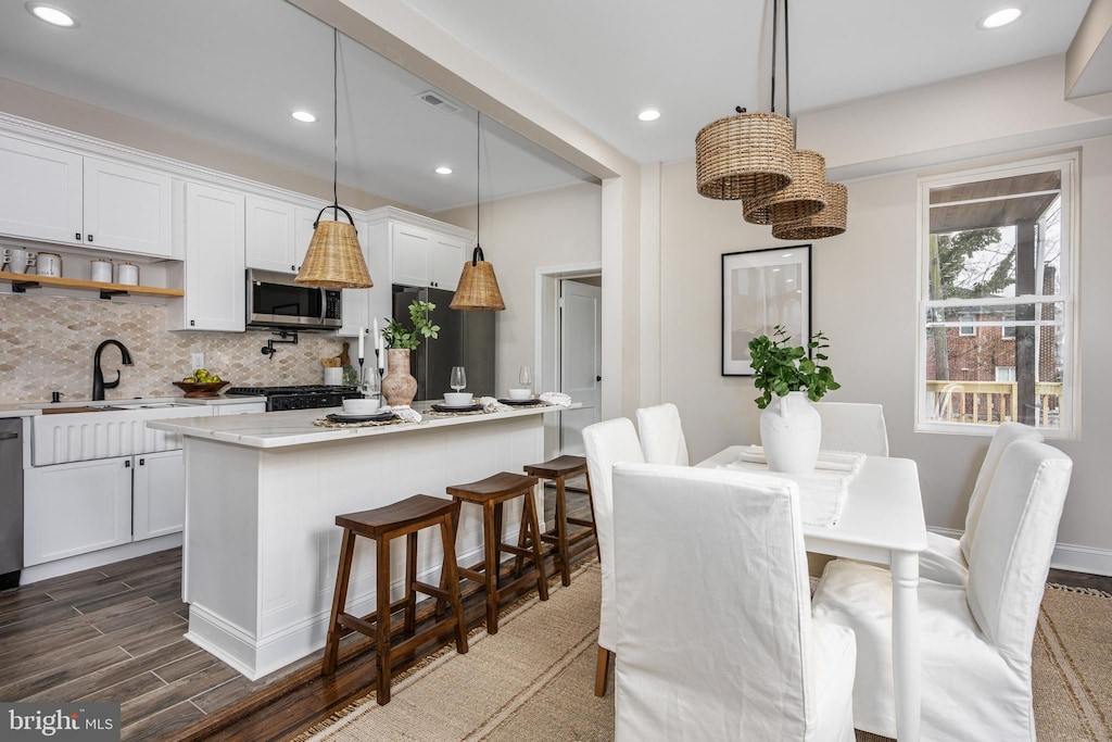 3717 Falls Rd, Baltimore, MD 21211 - dining space with dark wood finished floors and recessed lighting