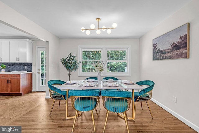 1528 Stuyvesant Ave, Trenton, NJ 08618 - dining space with a chandelier and baseboards