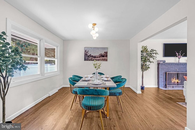 1528 Stuyvesant Ave, Trenton, NJ 08618 - dining room with wood finished floors and a fireplace