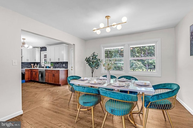 1528 Stuyvesant Ave, Trenton, NJ 08618 - dining space with a chandelier and parquet floors