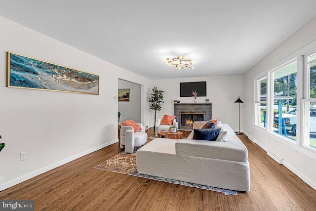 1528 Stuyvesant Ave, Trenton, NJ 08618 - living area with wood finished floors and a fireplace