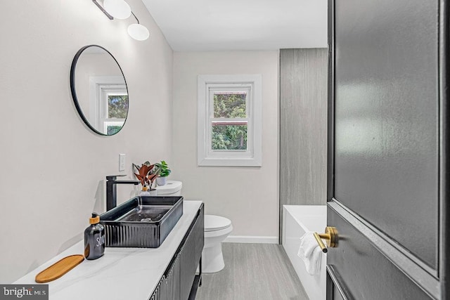 1528 Stuyvesant Ave, Trenton, NJ 08618 - bathroom with vanity, wood finished floors, and shower / bath combination