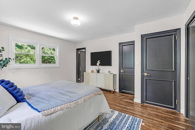 1528 Stuyvesant Ave, Trenton, NJ 08618 - bedroom featuring dark wood-style floors and baseboards