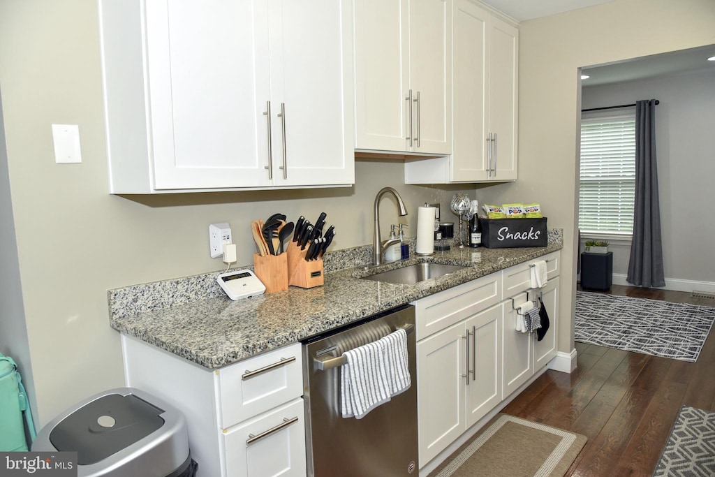 1510 Karen Blvd, District Heights, MD 20747 - kitchen with dishwasher, dark wood-style flooring, white cabinets, and light stone countertops