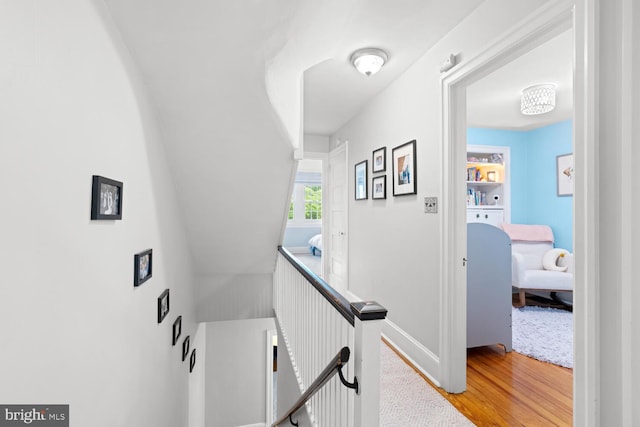 16 E Abington Ave, Philadelphia, PA 19118 - corridor featuring wood finished floors and an upstairs landing