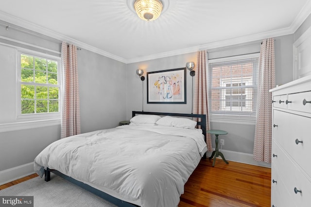 16 E Abington Ave, Philadelphia, PA 19118 - bedroom featuring wood finished floors and ornamental molding