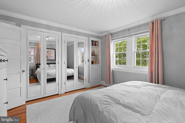 16 E Abington Ave, Philadelphia, PA 19118 - bedroom featuring crown molding, wood finished floors, and french doors
