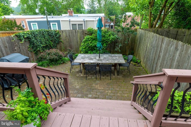 16 E Abington Ave, Philadelphia, PA 19118 - deck with outdoor dining space, a fenced backyard, and a patio