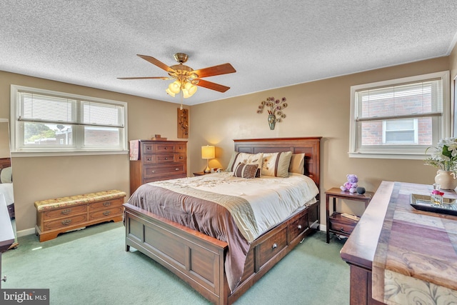 8905 Dewees St, Philadelphia, PA 19152 - bedroom featuring light carpet, ceiling fan, and a textured ceiling