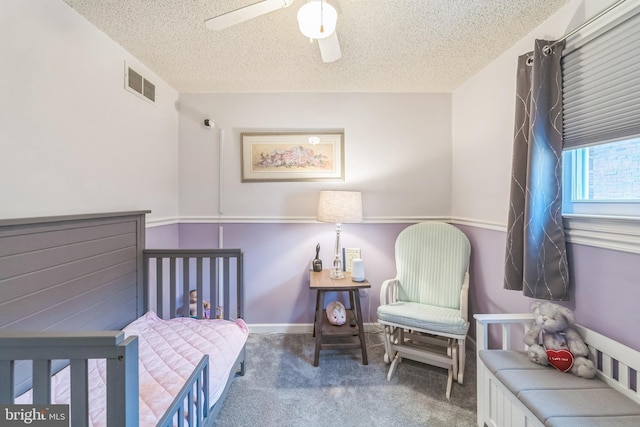 8905 Dewees St, Philadelphia, PA 19152 - bedroom with a textured ceiling, carpet floors, and a ceiling fan