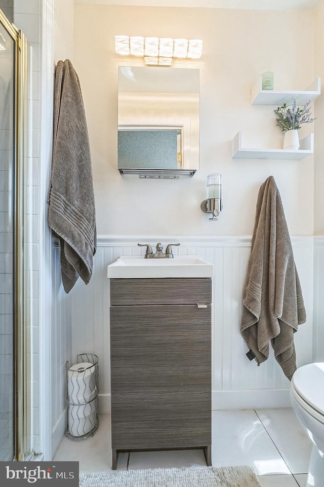 8905 Dewees St, Philadelphia, PA 19152 - full bathroom featuring vanity, wainscoting, and a tile shower