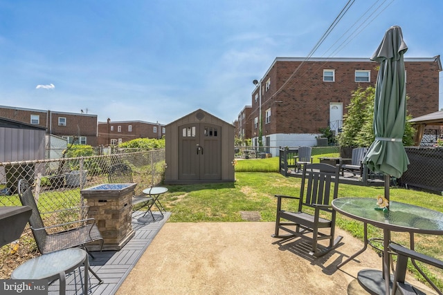 8905 Dewees St, Philadelphia, PA 19152 - fenced backyard with a shed, a patio area, and a residential view