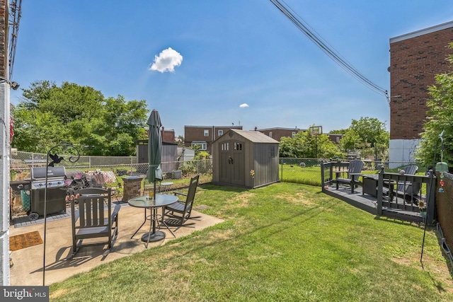 8905 Dewees St, Philadelphia, PA 19152 - fenced backyard featuring a storage unit and a patio