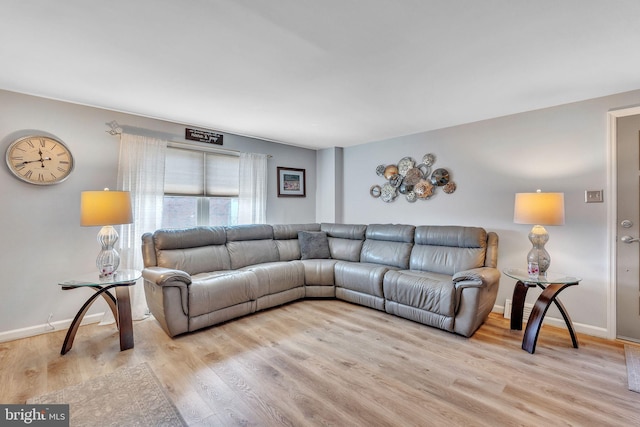 8905 Dewees St, Philadelphia, PA 19152 - living area with light wood-type flooring and baseboards