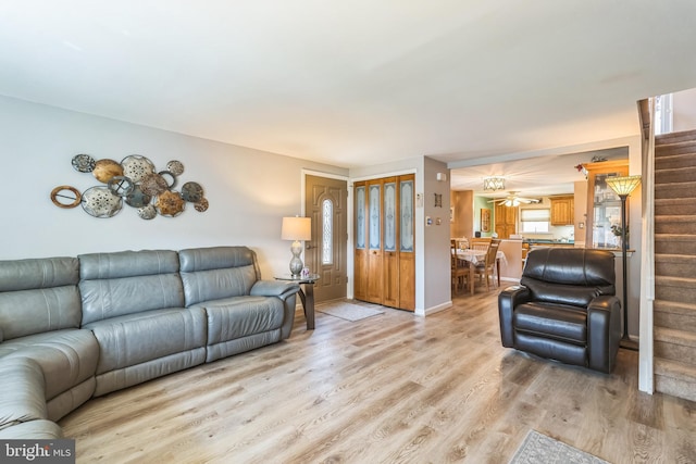 8905 Dewees St, Philadelphia, PA 19152 - living room with stairway and light wood finished floors