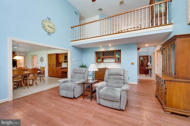 14 Quail Ridge Dr, Reading, PA 19607 - living room featuring a towering ceiling and light wood-style flooring