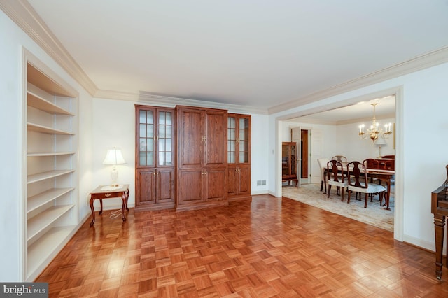 14 Quail Ridge Dr, Reading, PA 19607 - foyer featuring a chandelier and crown molding