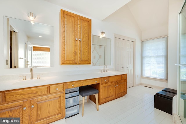 14 Quail Ridge Dr, Reading, PA 19607 - full bathroom featuring double vanity, lofted ceiling, a shower with door, and tile patterned flooring