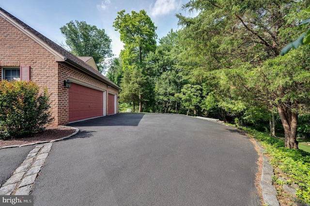 14 Quail Ridge Dr, Reading, PA 19607 - garage with asphalt driveway