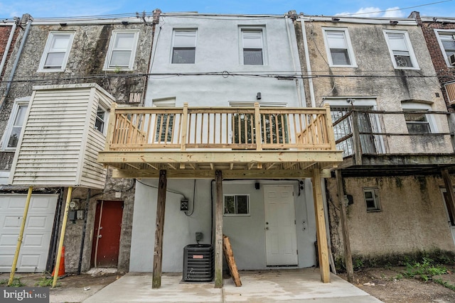 4641 Fernhill Rd, Philadelphia, PA 19144 - rear view of house featuring stucco siding and a deck