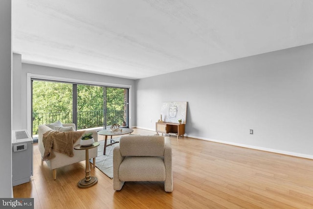 8308 Flower Ave Unit 403, Takoma Park, MD 20912 - living area featuring light wood finished floors and baseboards