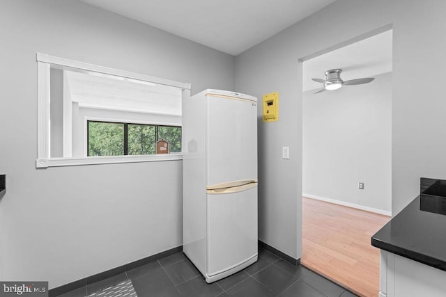 8308 Flower Ave Unit 403, Takoma Park, MD 20912 - washroom with a ceiling fan and dark tile patterned floors