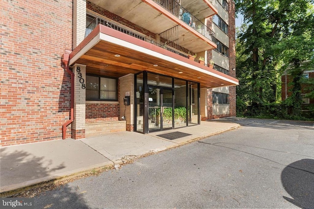 8308 Flower Ave Unit 403, Takoma Park, MD 20912 - doorway to property with brick siding