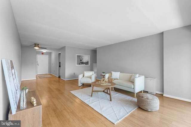8308 Flower Ave Unit 403, Takoma Park, MD 20912 - living area featuring wood finished floors and ceiling fan