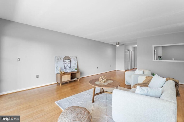 8308 Flower Ave Unit 403, Takoma Park, MD 20912 - living area with wood finished floors and a ceiling fan