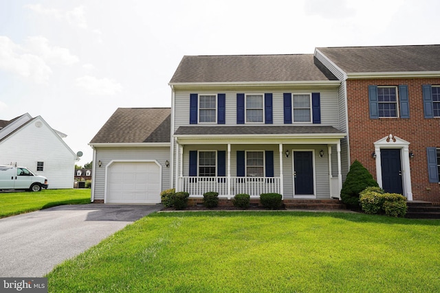 1322 Aspen Dr, Salisbury, MD 21804 - view of front of home featuring covered porch, a garage, driveway, and a front lawn