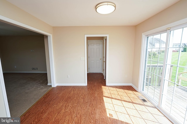 1322 Aspen Dr, Salisbury, MD 21804 - unfurnished room with baseboards and light wood-style flooring