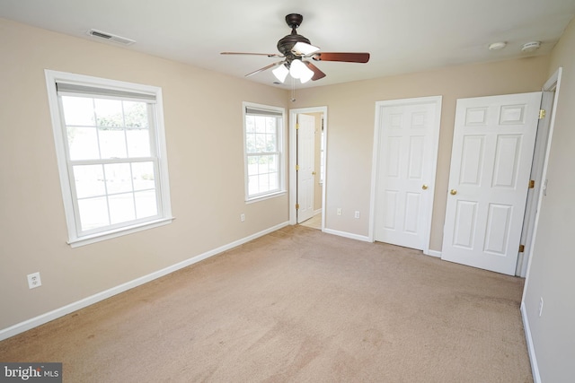 1322 Aspen Dr, Salisbury, MD 21804 - unfurnished bedroom with carpet floors, connected bathroom, and ceiling fan