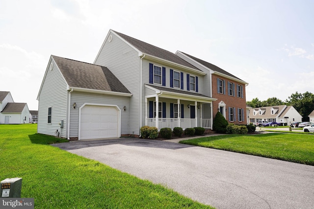 1322 Aspen Dr, Salisbury, MD 21804 - colonial house featuring a porch, a garage, a front lawn, and driveway