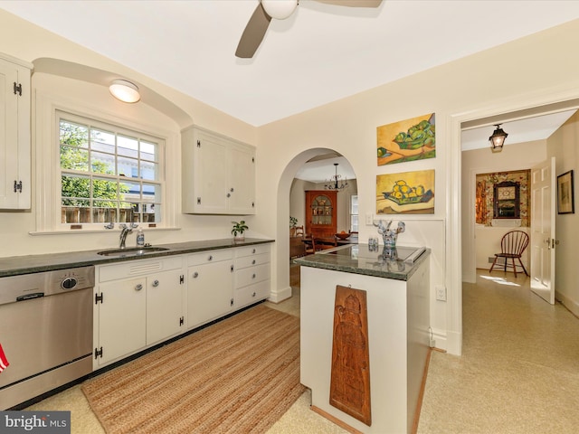 306 Grove Blvd, Frederick, MD 21701 - kitchen featuring stainless steel dishwasher, a ceiling fan, white cabinetry, and arched walkways