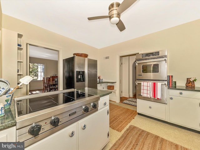 306 Grove Blvd, Frederick, MD 21701 - kitchen with appliances with stainless steel finishes, ceiling fan, dark countertops, and white cabinets