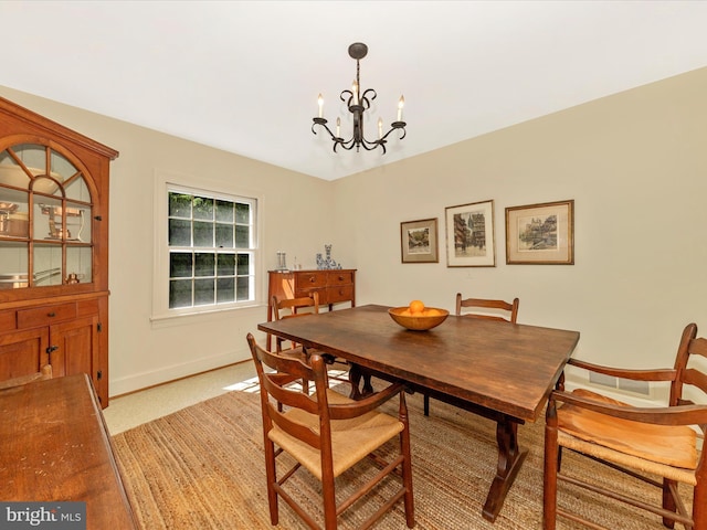 306 Grove Blvd, Frederick, MD 21701 - dining space with a chandelier and light colored carpet